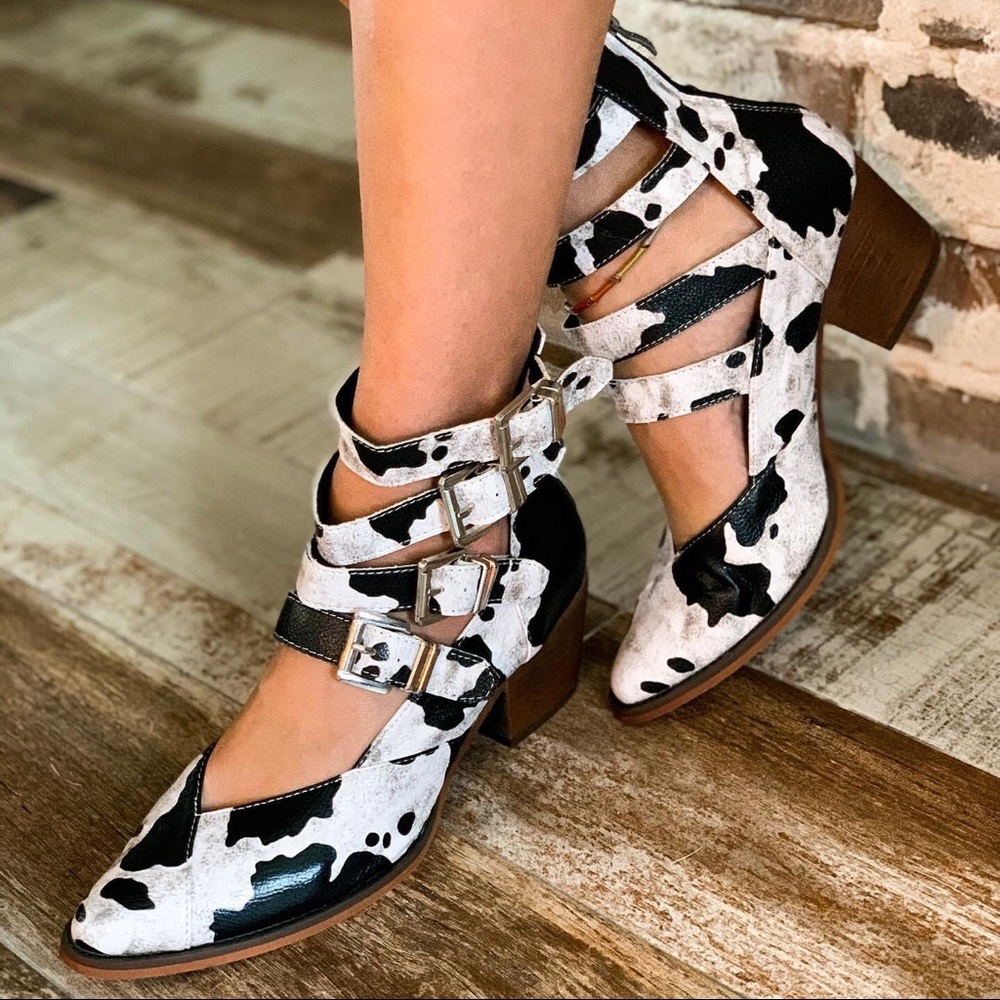 Stylish Black and White Heeled Boots